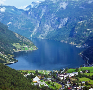 mountains and village in Geiranger fjord. 